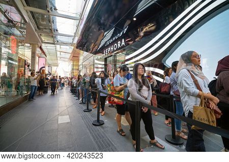 KUALA LUMPUR, MALAYSIA - JANUARY 18, 2020: people stand in line waiting for the grand opening of Sephora store at Fahrenheit 88 shopping mall in Kuala Lumpur.