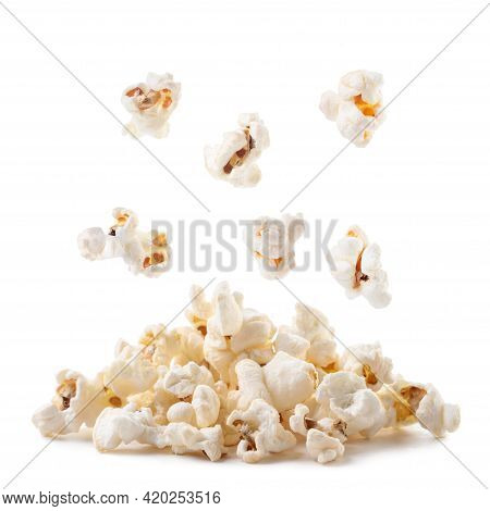 Popcorn Falls On A Heap Close-up On A White Background. Isolated