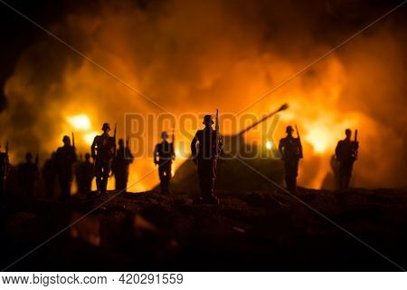 War Concept. Military Silhouettes Fighting Scene On War Fog Sky Background, World War Soldiers Silho