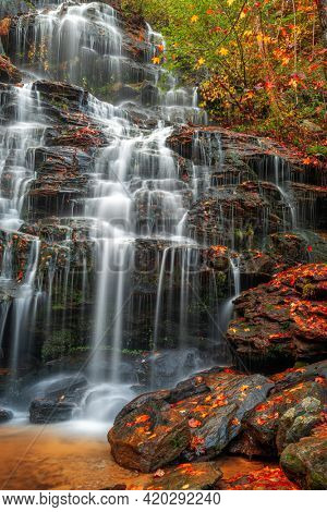 Issaqueena Falls during autumn season in Walhalla, South Carolina, USA.