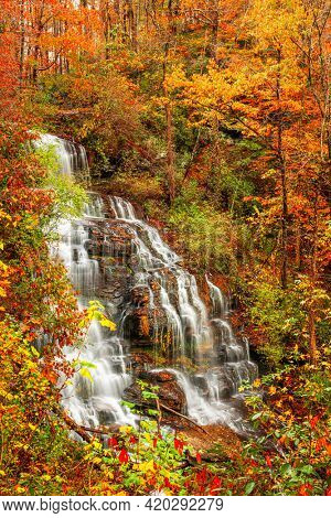 Issaqueena Falls during autumn season in Walhalla, South Carolina, USA.