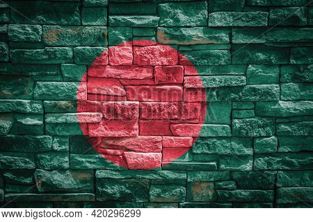 National Flag Of Bangladesh On Stone  Wall Background.the Concept Of National Pride And Symbol Of Th