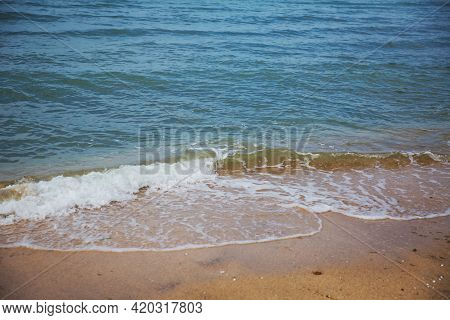 Clean And Relaxing Sea Wave Splashes Over Seashore. Coral Beach Of Tropical Paradise. Idyllic Seasca