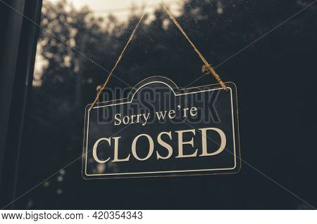 Sorry We Are Closed - Close Sign Broad Hanging Front Of Entrance Door With Copy Space At Coffee Shop
