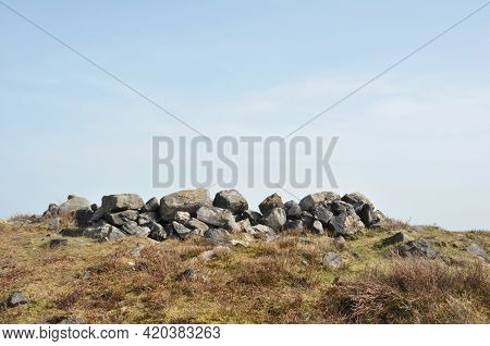 The Exposed Stones At The Top Of A Cairn Known As The Millers Grave On Midgley Moor In Calderdale We