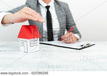 Lady Presenting New Home Insurance Deals In Outfit, Business Woman Showing Possible Mortegage Oppurt