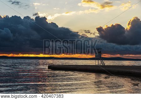 Lifeguard Observation Tower On The Beach At Sunset, Adriatic Sea, Croatia.