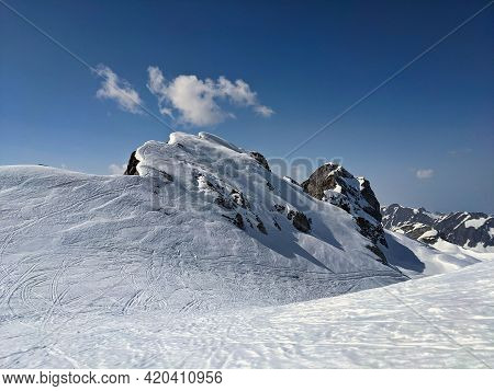 Snowy Mountain Peaks In Winter Above Kloental In The Canton Of Glarus.ski Mountaineering On The Mutt