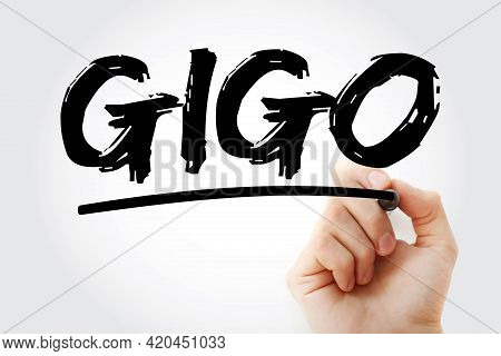 Gigo - Garbage In Garbage Out Acronym With Marker, Technology Concept Background