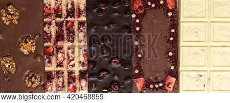 Different Kinds Fof Chocolate Bars Laying Down In A Row. Dark One, Milk And White, With Pieces Of Nu
