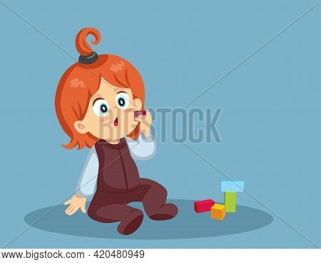 Toddler Child About To Swallow A Cube Toy