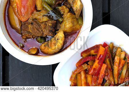 A Close Up Picture Of Meat Dalca And Spicy 