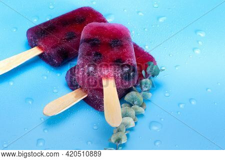 Homemade Raspberry And Blueberry Ice Cream Top View On Blue Background Summer, Desser, Food Concept 