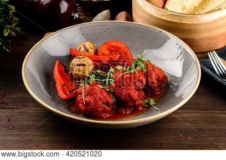 Meatballs With Vegetables Close-up On The Table