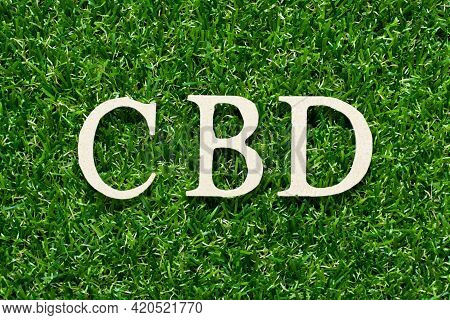 Wood Alphabet Letter In Word Cbd (abbreviation Of Central Business District Or 
Cannabidiol) On Gree