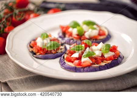 Baked Eggplant With Parmesan Cheese, Tomatoes And Basil