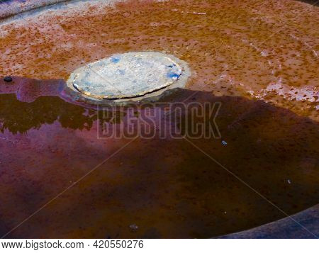 Rusty Old Barrel In A Sunny Garden