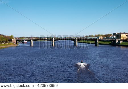 Tver, Russia, May 2021: View Of The Novovolzhsky Bridge On The Volga River In Tver. Boat On The Volg