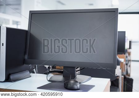 Blank Screen Monitor. Asian Teacher Groups Training Computer Technology Coding Application On Smartp