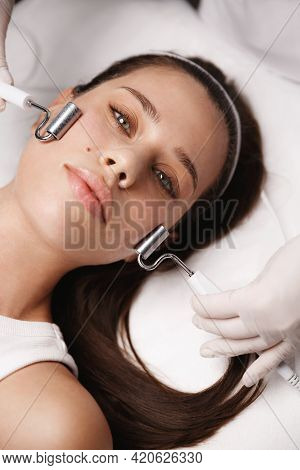 Woman Beauty Face With Galvanic Gel, Female Patient Receives Galvanic Facial Treatment, Penetrating 