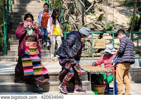 Kathmandu, Nepal, March 09 2020: People Wearing Face Protective Mask For Coronavirus Covid 19, Shopp