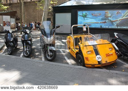 Barcelona, Spain, 1.09.2020 - Go Car Parked In Scooter Parking Lot In Barcelona, Go Car Is Touristic