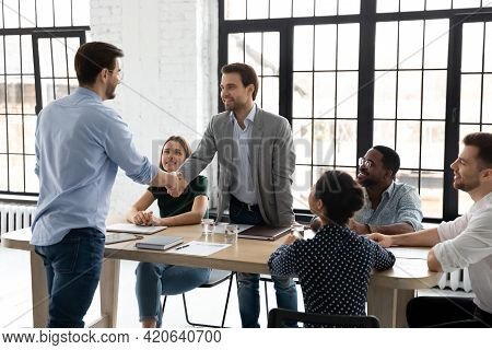 Happy Millennial Business Team Welcoming New Employee