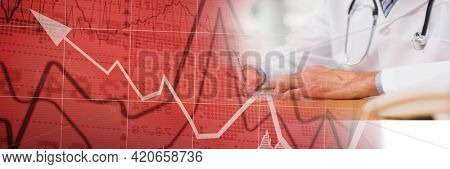 Composition of financial data processing over male doctor writing. medicine and healthcare services concept digitally generated image.