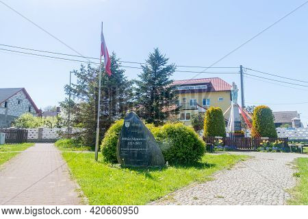 Skowarcz, Poland - May 12, 2021: Square With Stone Monument For 800th Anniversary Of Skowarcz.