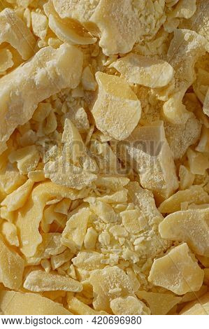 Pieces Of Crushed Cocoa Butter. Chopped Cocoa Oil. The Concept Of Natural Skin And Hair Care. Vertic