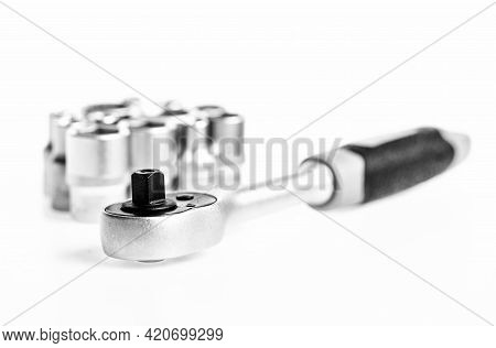 Ratchet Tool. Universal Socket Set White Background Isolated. Crafts And Repair. Knob For Socket Wre