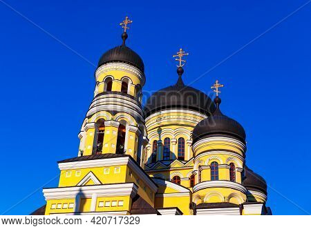 Domes Of Monastery Hincu From Moldova . Crosses On The Cupolas . Place Of Worship