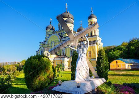 Monument Of Jesus Christ With Cross In Front Of Monastery  Hincu , Moldova . Religious Sculpture Mad