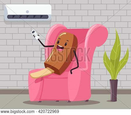 Funny Ice Cream With Remote Control Of The Air Conditioner Sits On The Couch In The Interior Of The 