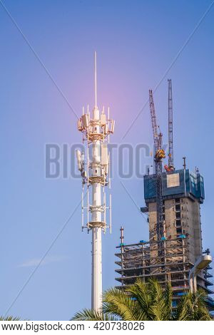 communication tower for 4G 5G network telephone cellsite with dusk sky