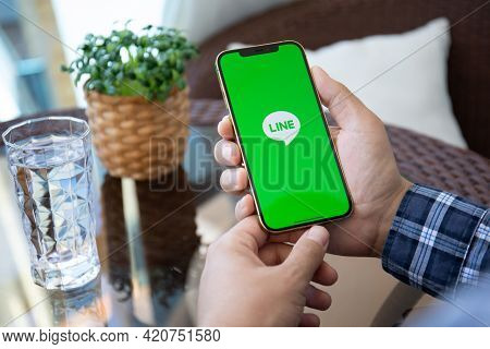 Alanya, Turkey - May 9, 2020: Man Hand Holding Iphone 12 Pro Max Gold With Social Networking Service