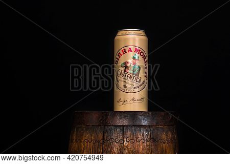 Can Of Birra Moretti Beer On Wooden Barrel With Dark Background. Illustrative Editorial Photo Buchar