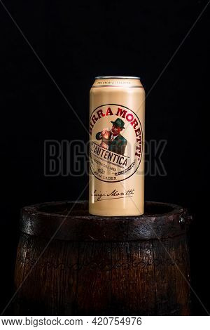 Can Of Birra Moretti Beer On Wooden Barrel With Dark Background. Illustrative Editorial Photo Buchar