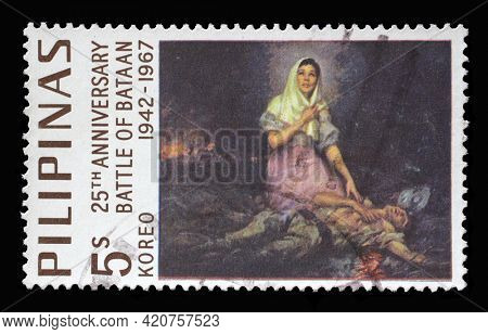 ZAGREB, CROATIA - SEPTEMBER 18, 2014: Stamp printed in Philippines shows Succour, by Fernando Amorsolo, 25th anniversary of the Battle of Bataan, circa 1967