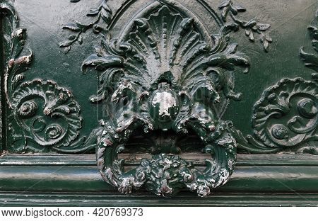 European Vintage Old Metal Wrought Iron Door Knocker. Design Detail. Paris.