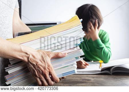 Ambitious Parenting With High Academic Achievement Expectations From Kids Concept. A Mother Is Bring