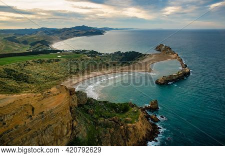Castlepoint From A Helicopter The Air, Check Out The Surfers In The Water, The Person At The Top Of 