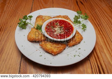 American Cuisine Dish Known A Mozzarella Sticks