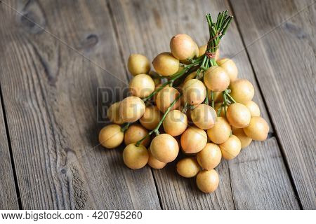 Rambi Harvest From Tree At The Garden Summer Tropical Fruit In Thailand, Ripe Fresh Rambeh Fruit