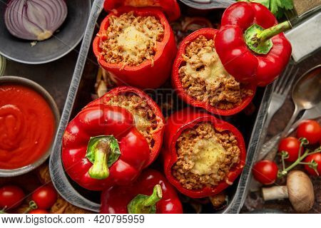 Red peppers stuffed with beef meet and mozarella cheese with herbs and garlic