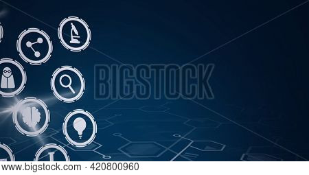 Composition of network of science and medical icons on hexagons over glowing blue background. global science, medicine and research concept digitally generated image.