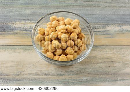 Turkish Salted Roasted Chickpeas In Glass Snack Bowl On Table
