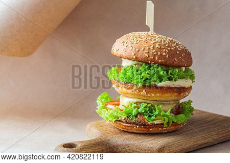 Vegan Burger With Vegetables And Hummus, Brown Kraft Background. Recycling Food Packaging, Zero Wast
