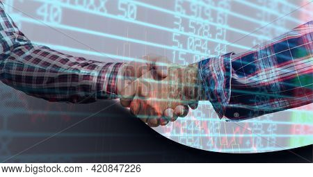 Stock market data processing against mid section of two businessmen shaking hands. global finance and business concept