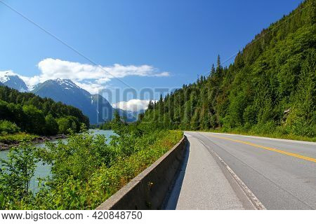 Road In A Beautiful Nature Scenery: Highway Next To Skeena River In The Canadian Rocky Mountains